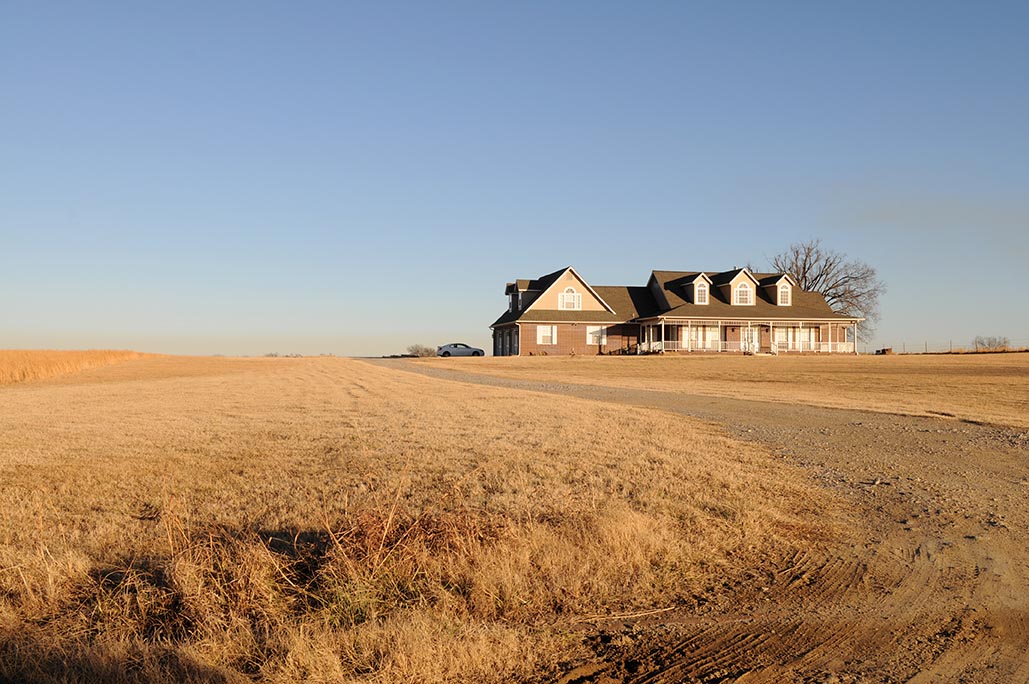 House and brown fields in Portales, NM
